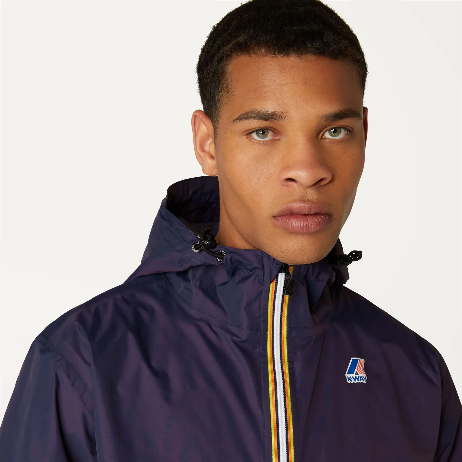 Claude - Unisex Packable Full Zip Waterproof  Rain Jacket in Violet